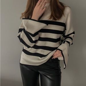 A stylish stripped sweater from Dynamite. Perfect quality and a great condition.